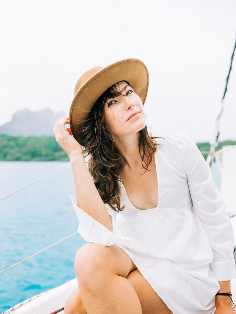 Portrait with hat on the boat