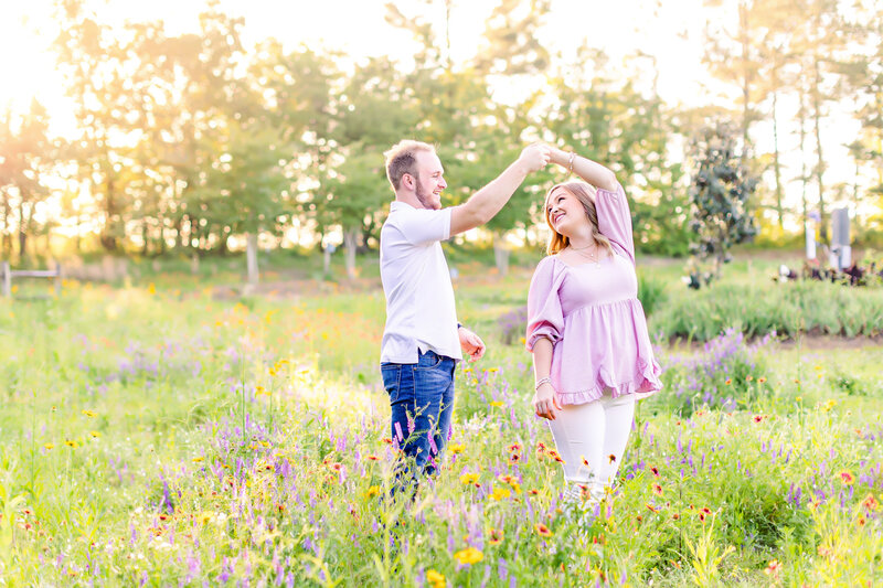 Engagement session with couple in wildflower field in Ridgeland MS.