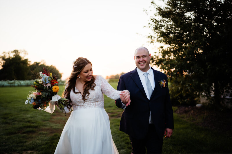 wedding couple embracing for kiss