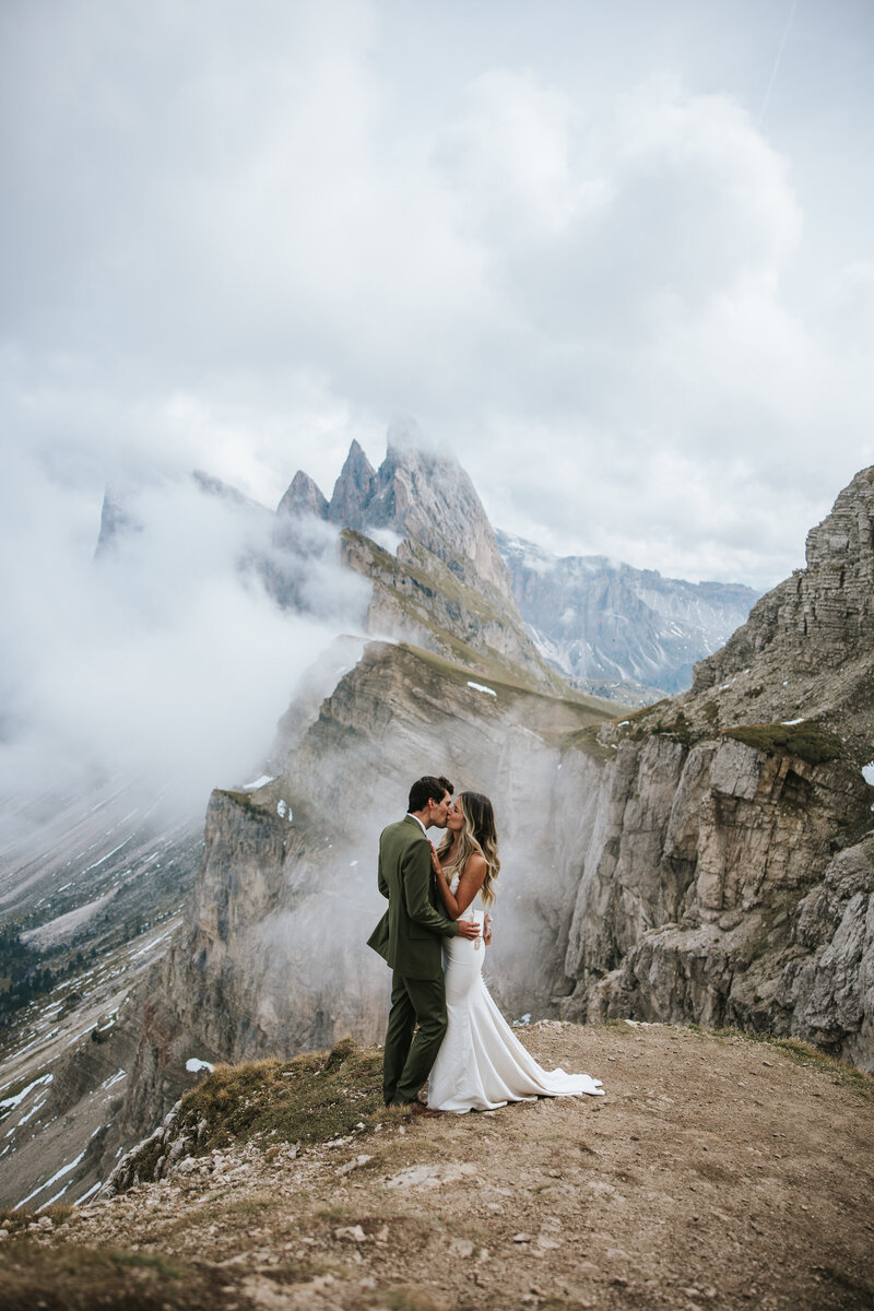 Couple enjoying their wedding day moments under Italy’s vast sky in the Dolomites.