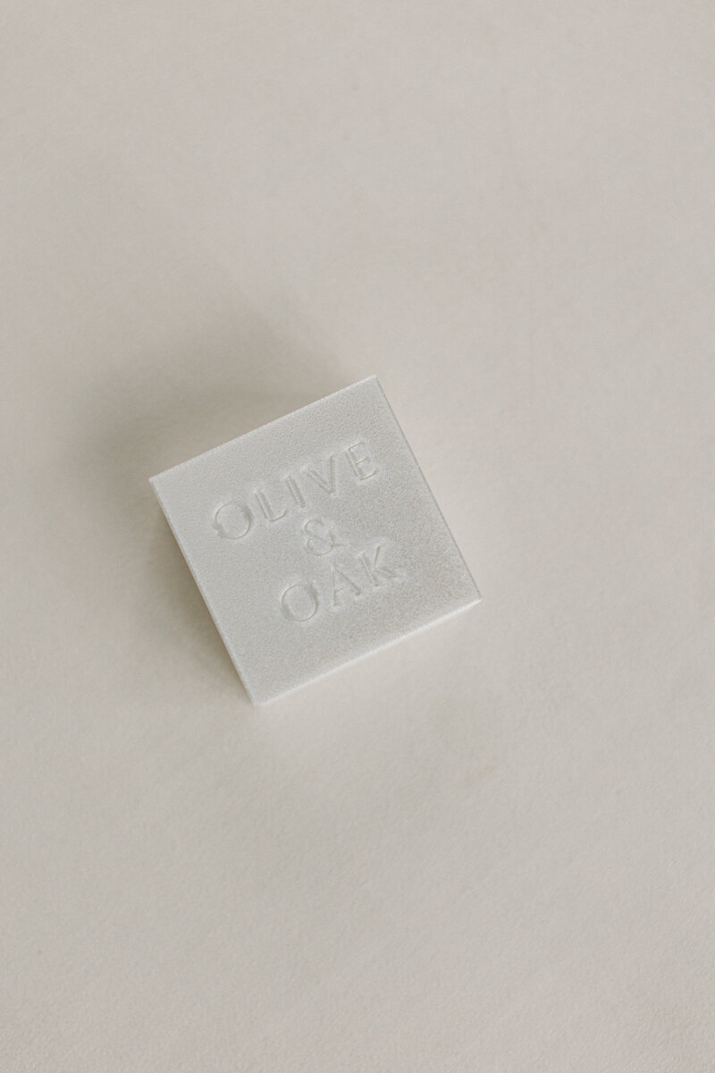 Square blocks used to add height and interest to flat lay designs