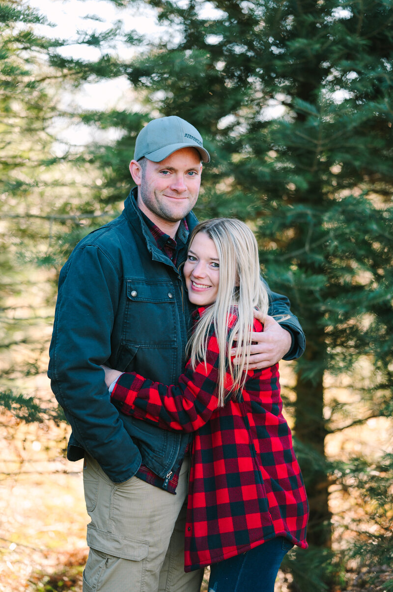 Engagement Photos in a Christmas Tree Farm in PA