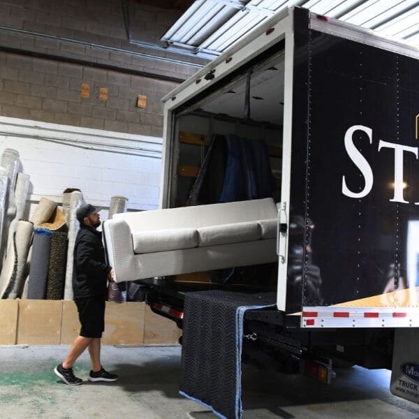 Kristopher of Staging Pros loading staging furniture