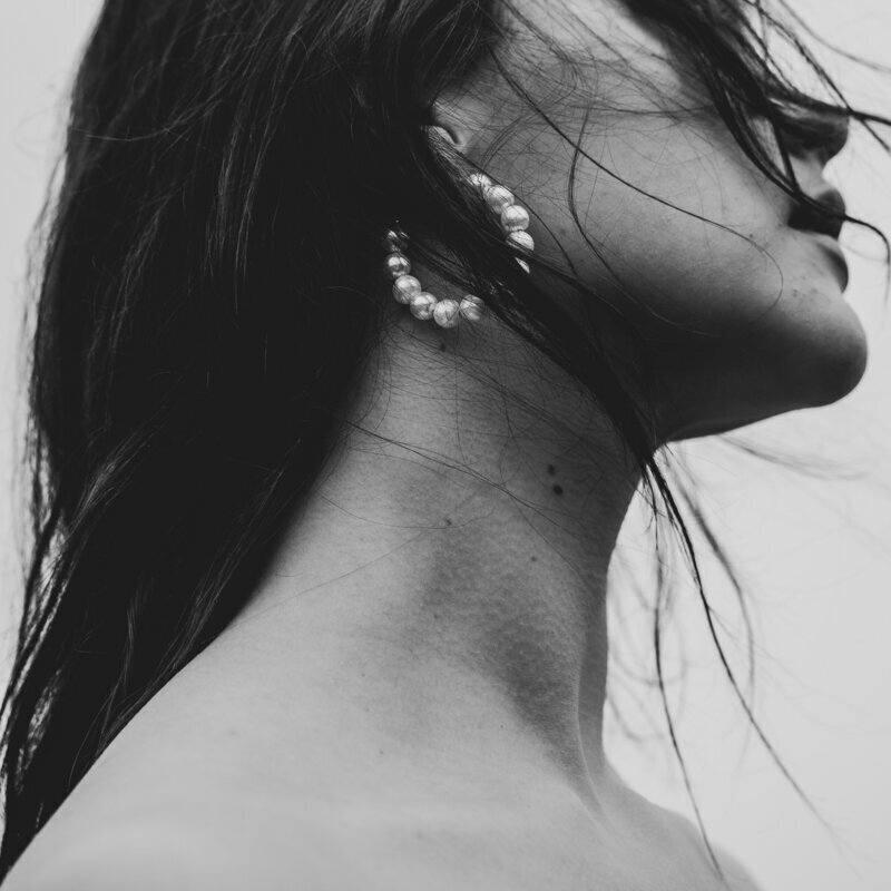 Stock Brand Photography for Wild Woman Haus, portrait of woman standing with elongated neck