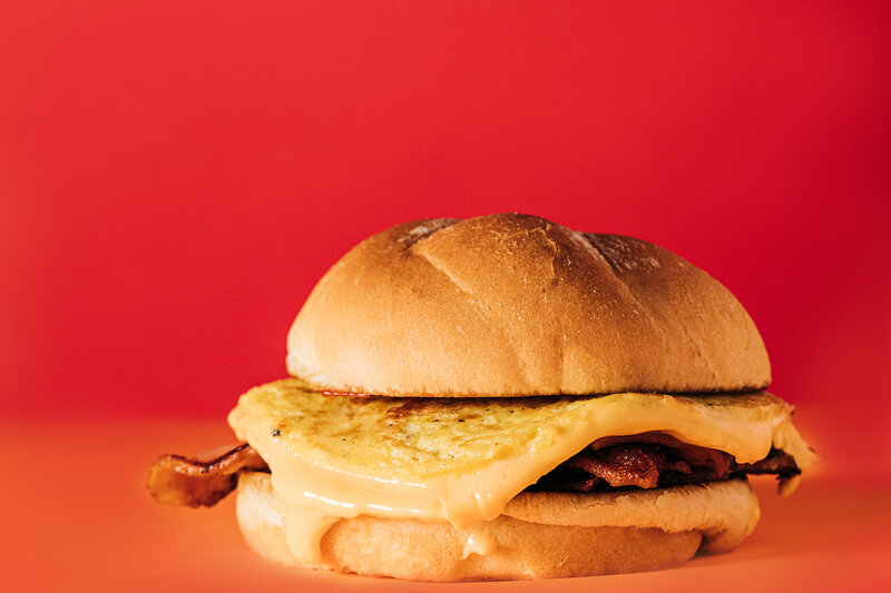 This client project for Good Day Cafe in Oxford, MS included a food styling shoot for their menu. This breakfast sandwich had eggs, cheese, bacon, and spicy ketchup.