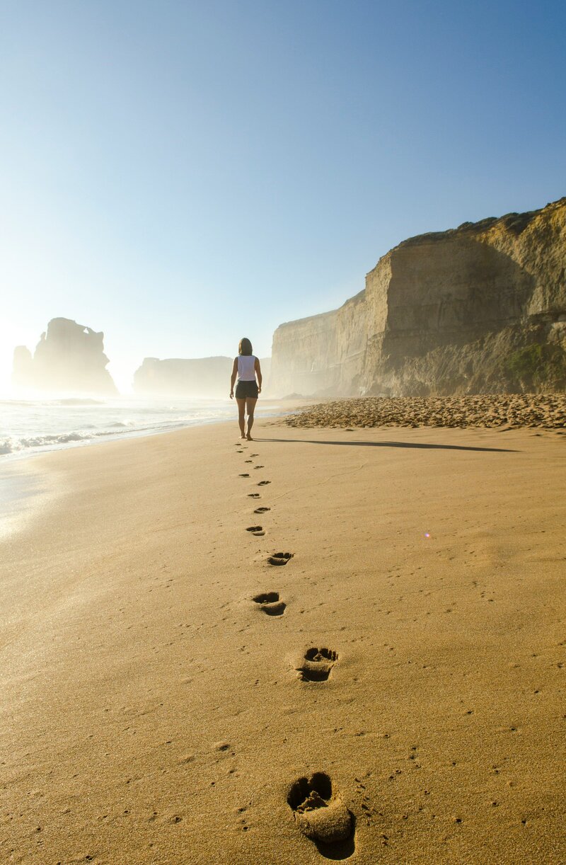 woman walking on beach