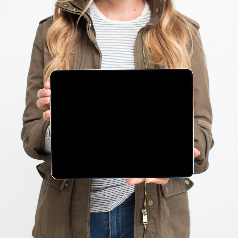 woman holding ipad