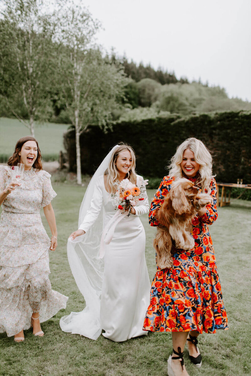 Bride WITH FRIENDS MARQUEE WEDDING