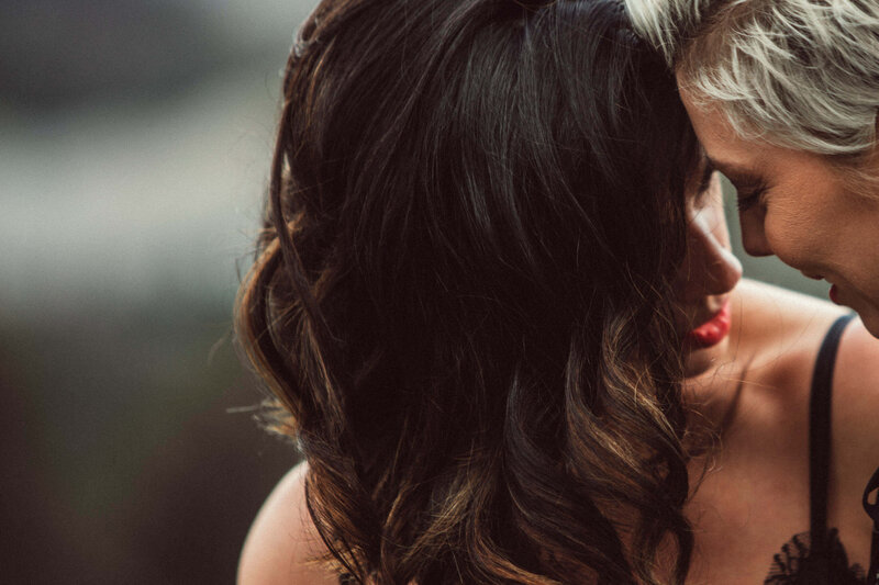 female couple embracing