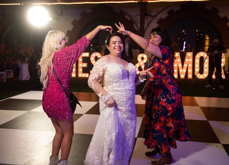 Bride Having Fun on the Dance Floor on Her Wedding Day