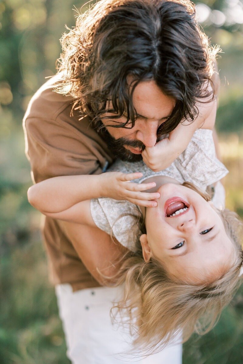 A loving portrait of a dad and daughter, captured by Emily Barbara, family photographer in Milwaukee.