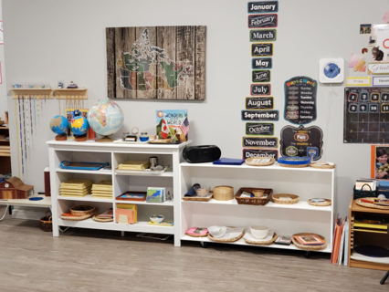 CLOVERDALE montessori shelves with learning supplies for childare daycare