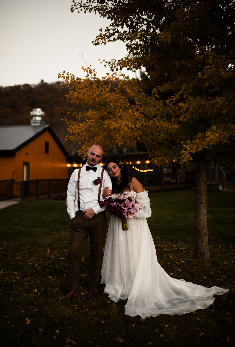 Bride and groom pose for a photo at River Mountain in Everett, PA