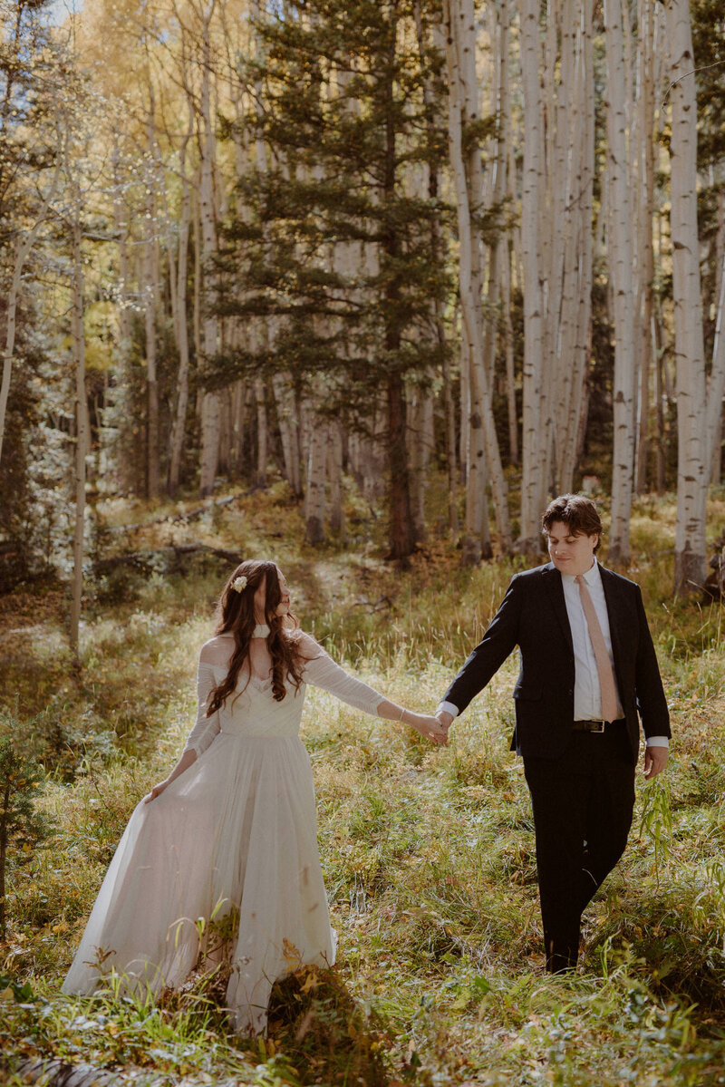 Bride and groom read vows on their elopement day