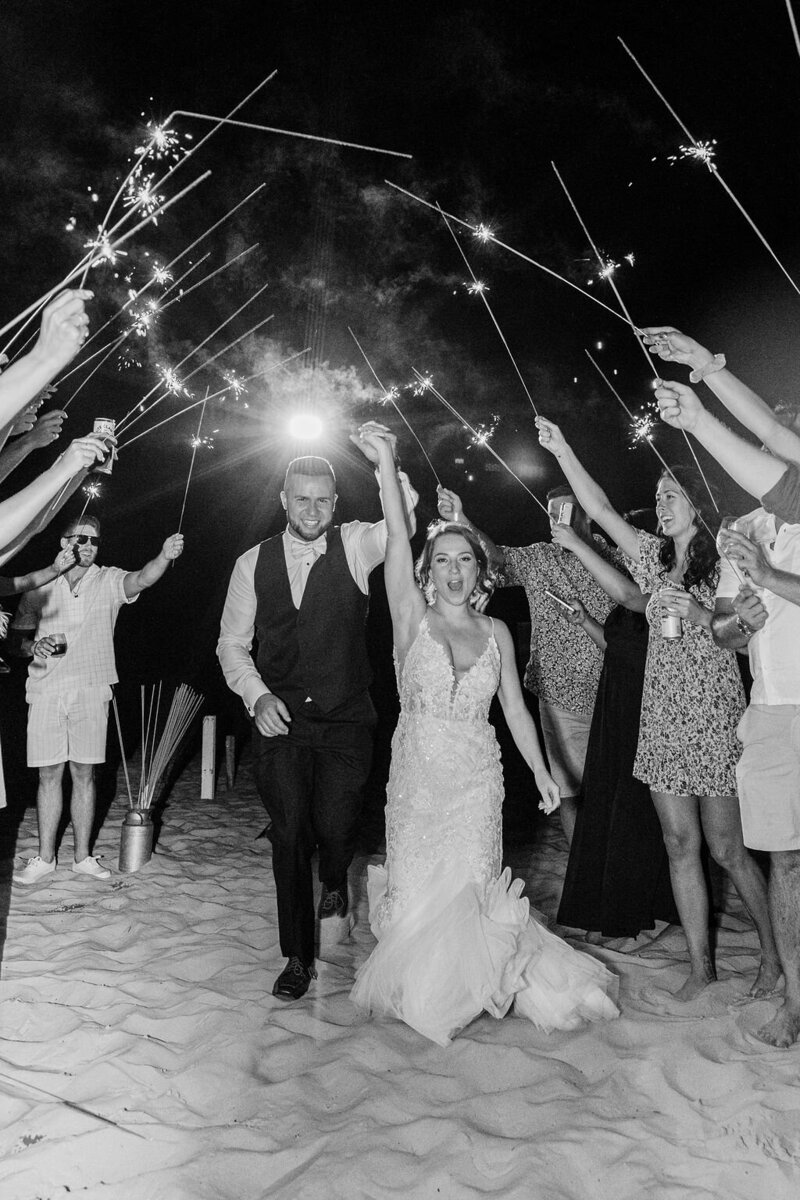 newlywed sparkler exit on beach