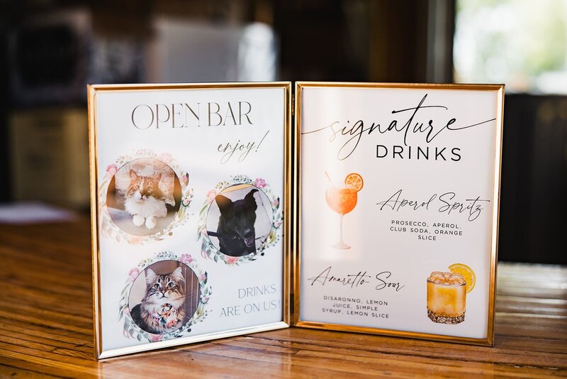 Bar menu featuring signature drinks and the couple's pets