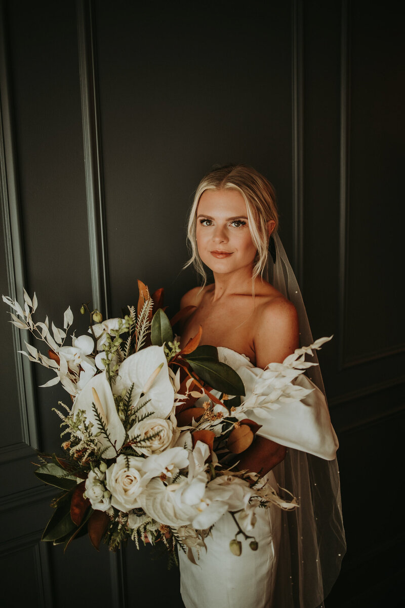 bride holding beautiful bouquet of flowers
