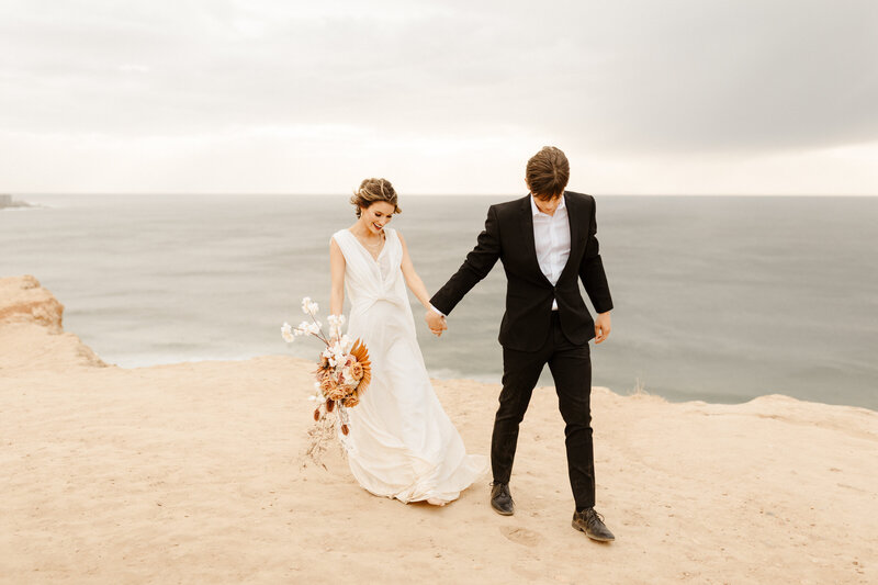 bride and groom at cliffside kauai elopement