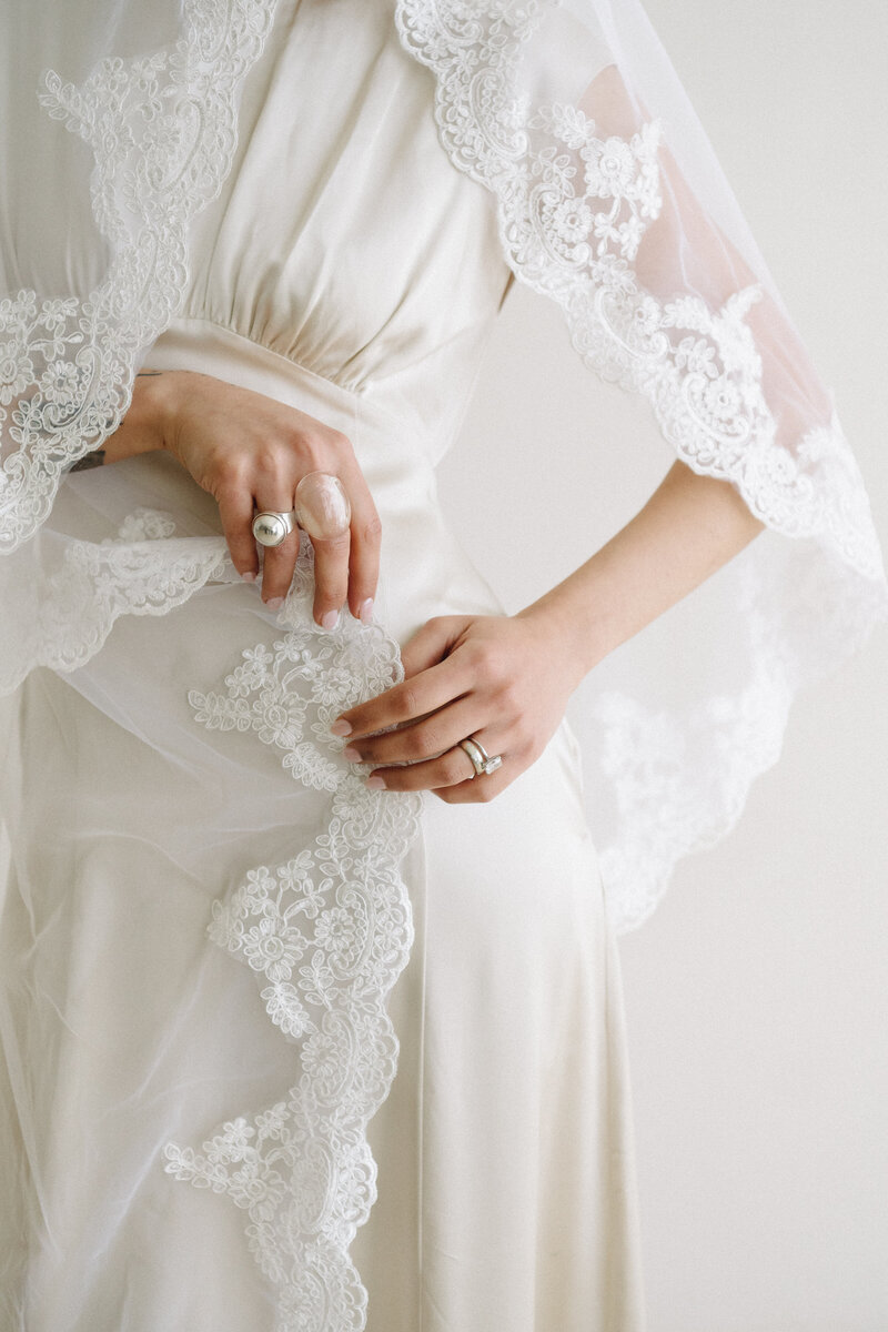 Bride at her ceremony - photographed by Detroit wedding photographer Jane Victoria