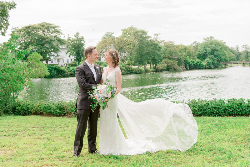 Bridal and Groom photo at Divine Park durinng Mill Spring Lake wedding.