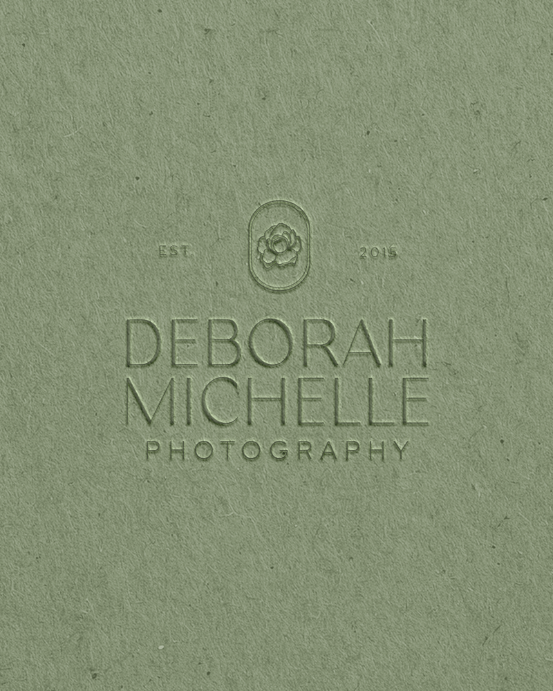 Deborah Michelle Photography Logo on Green Paper Mockup