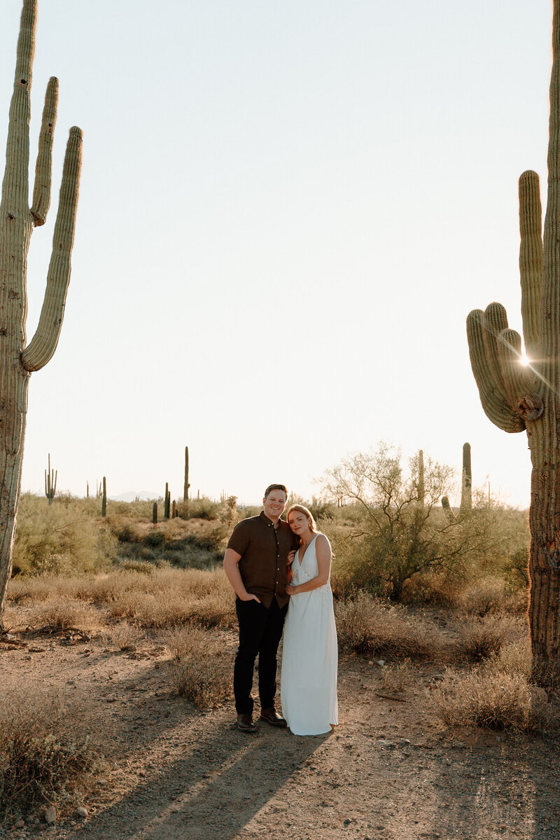 An elopement couples posing at lost dutchman state park