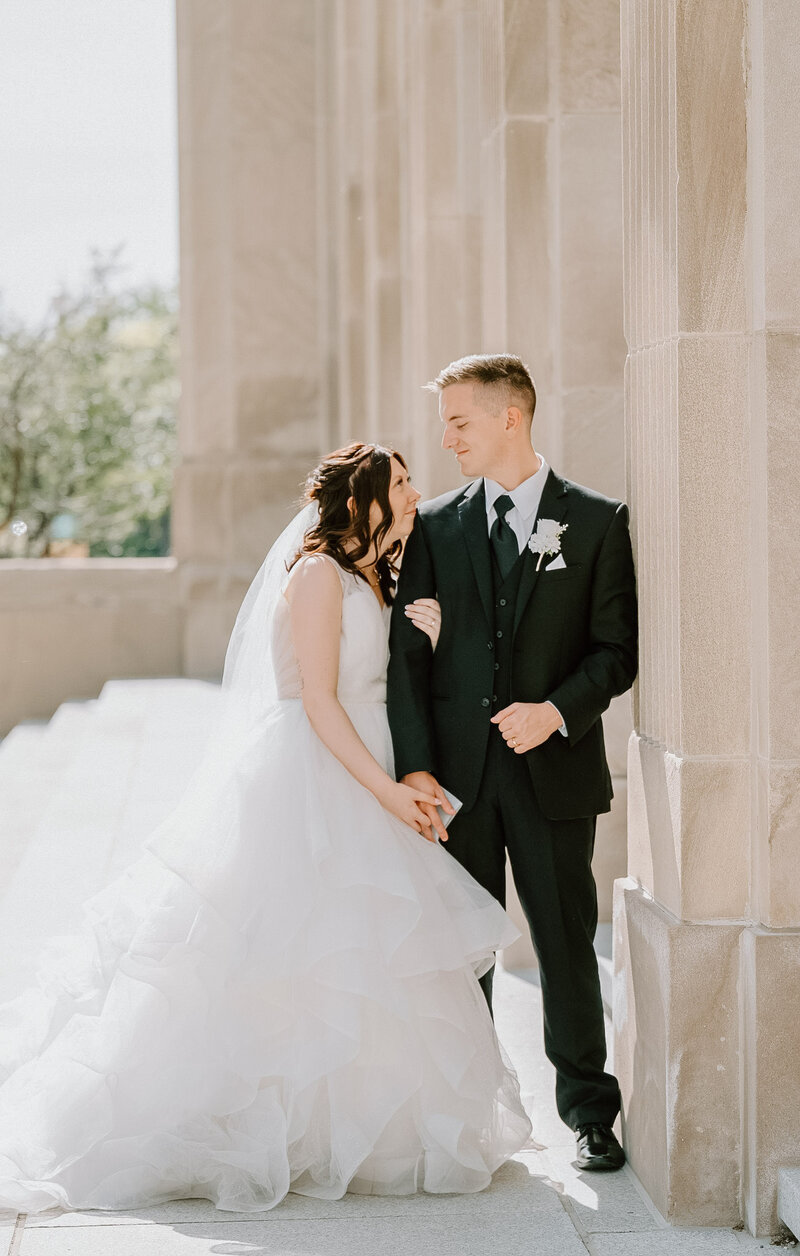 a bride and groom at their wedding in Grand Rapids by a West Michigan wedding photographer