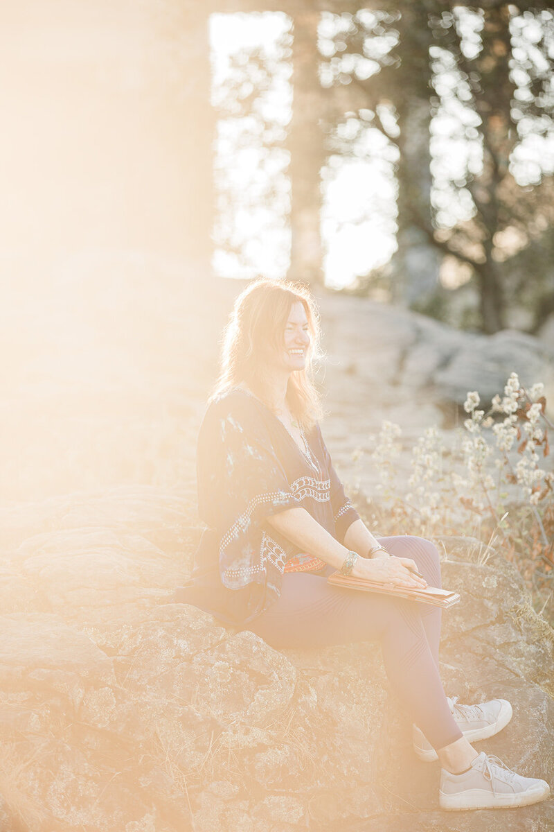 woman smiling in the sun