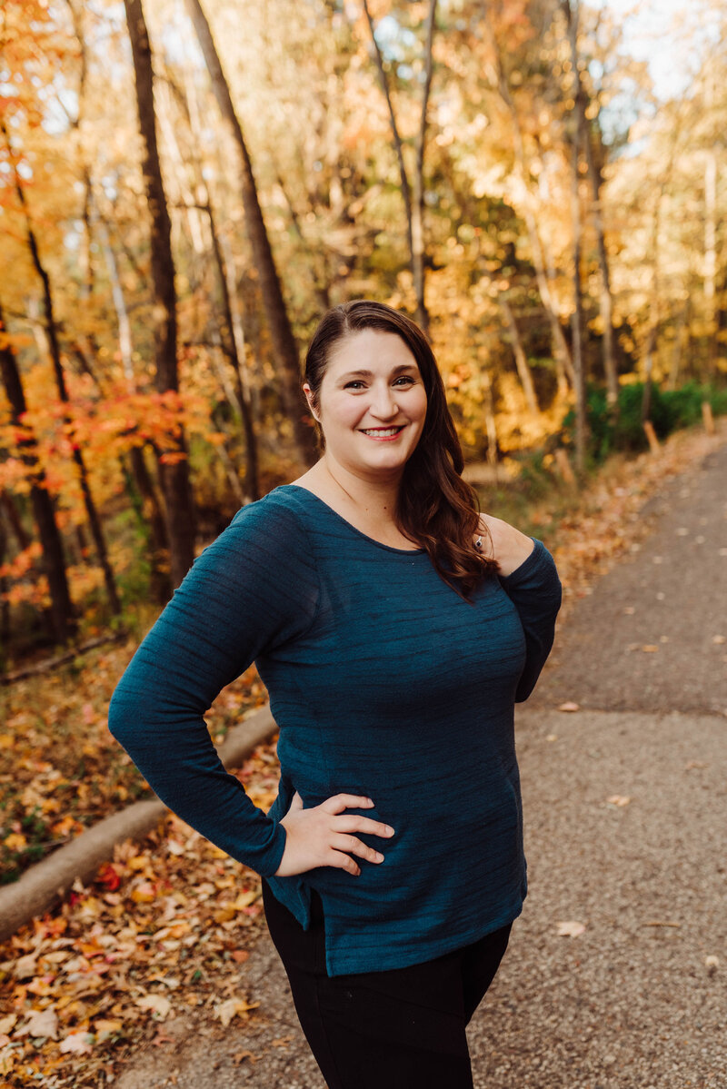 Amanda in a green shirt smiling