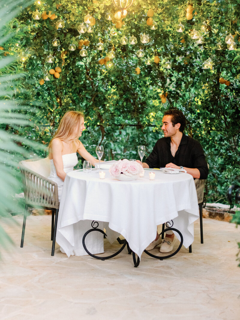 close shot, Private Secret Garden dinner (Michelin chef) table with the couple at the Four Seasons Grand Hotel du Cap-Ferrat