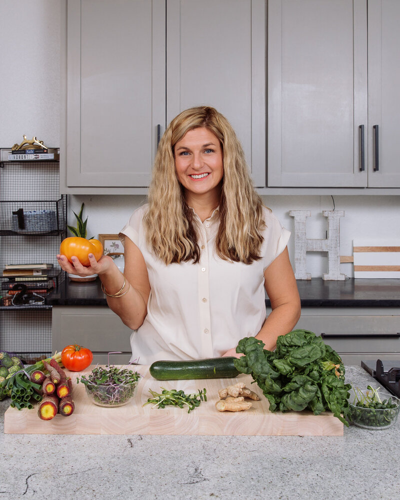 Amy showing how to cook a healthy meal for guy health and to balance hormones.