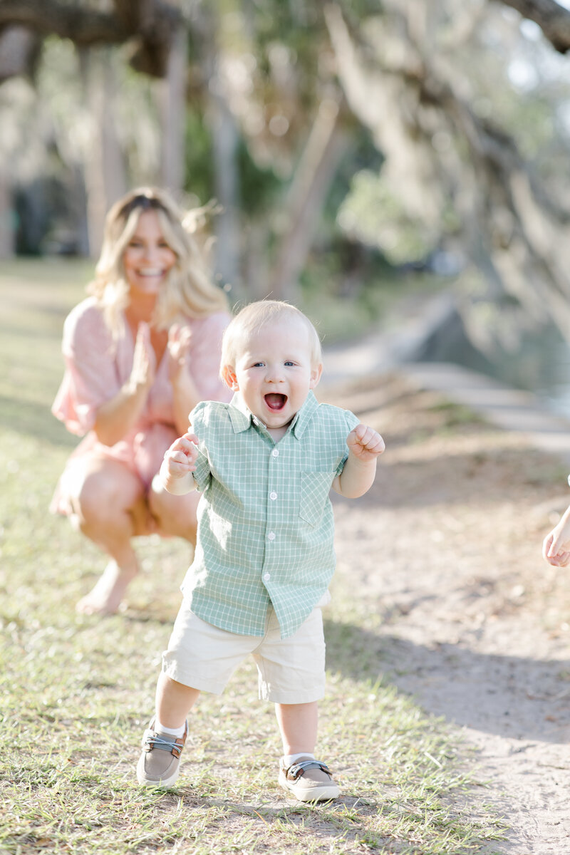 mom watching her toddler play