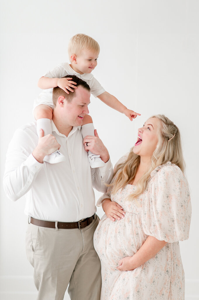 bother kissing new siblings head by Nashville Newborn Photographer Kristie Lloyd