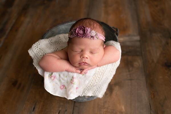 Fond du Lac Newborn Photo baby girl sleeping in bucket in studio | Glory Be Photography by Tara Bos
