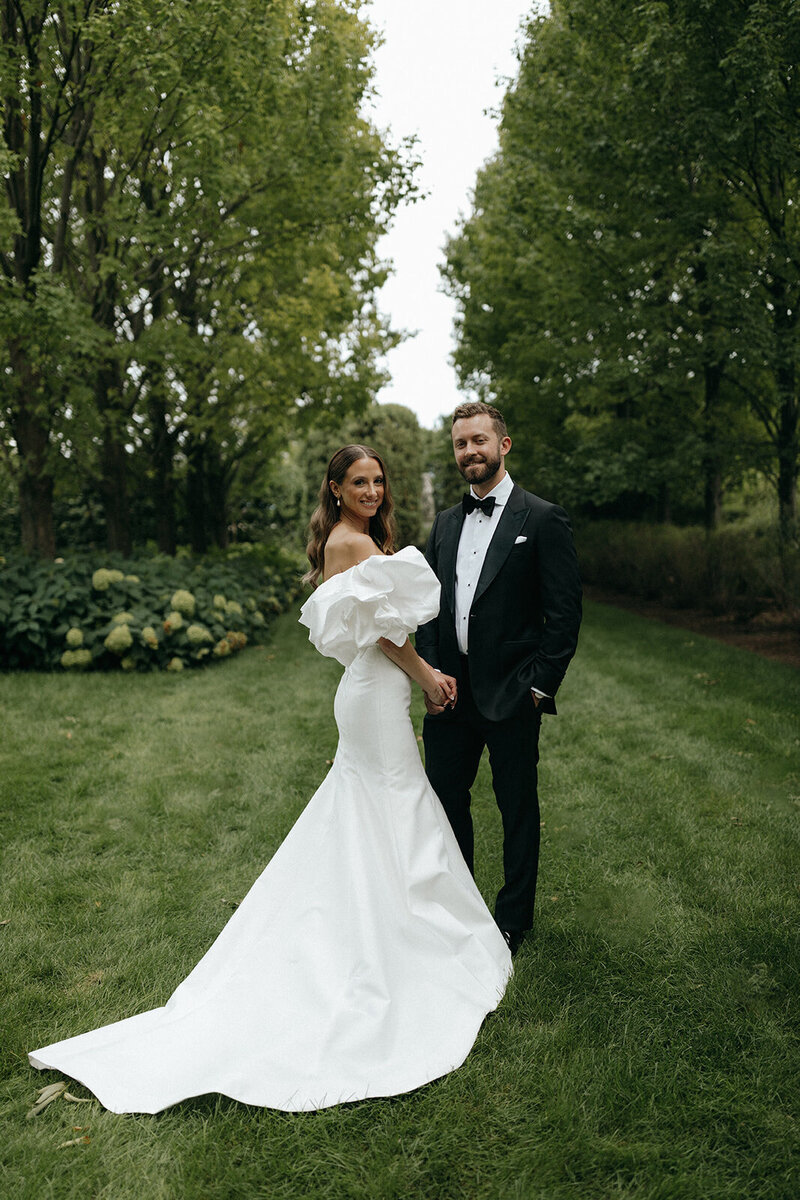 Bride and groom outside in garden