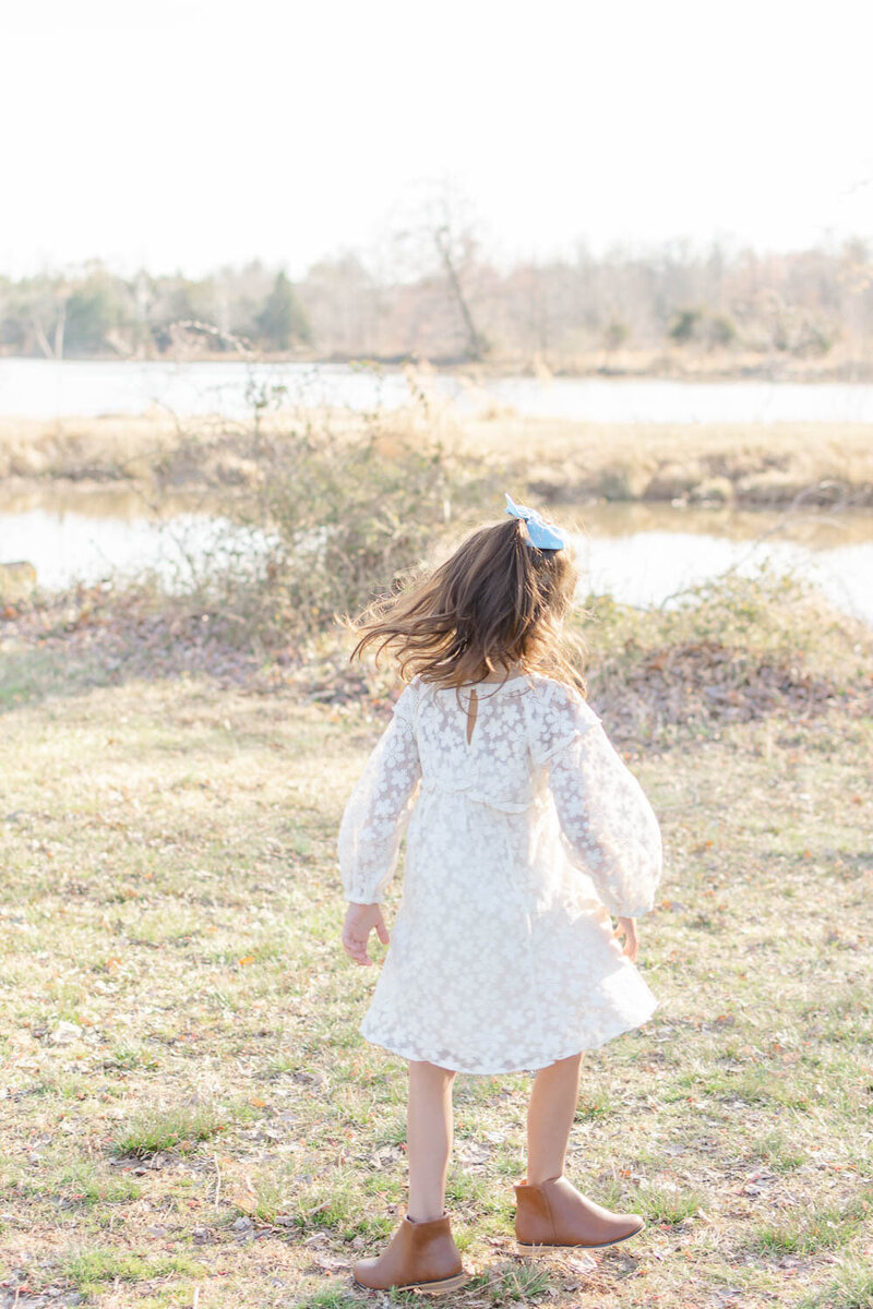 Little girl twirling taken by a photographer in Centreville, VA