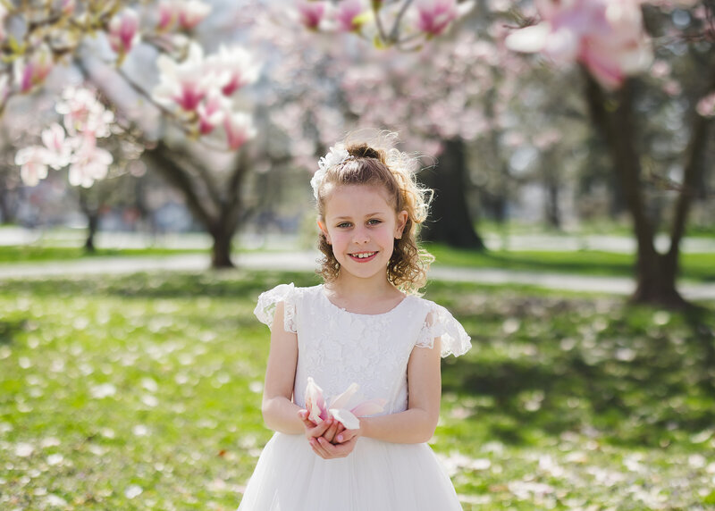 First Communion photo of girl in a NJ park.