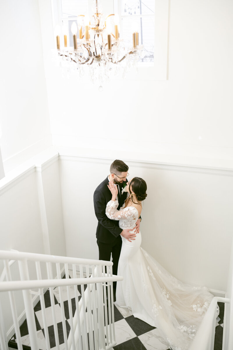 a bride and groom at The Broadway Avenue taken by a Grand Rapids wedding photographer
