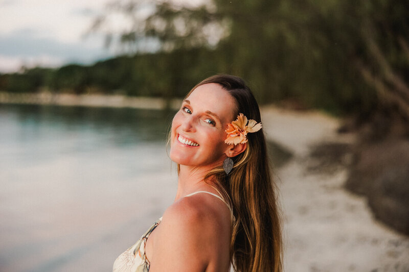 bride leaning into groom from behind