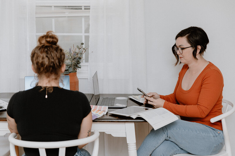 Women working together on a design project