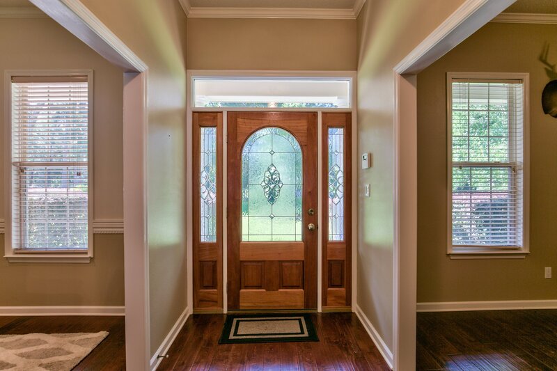 49 Bedeckers Interiors - Kristine Gregory - Lake Living Foyer BEFORE