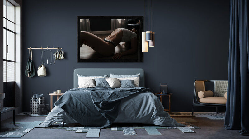 Artwork of a girl wearing lingerie in a New England boudoir studio hanging above a bed