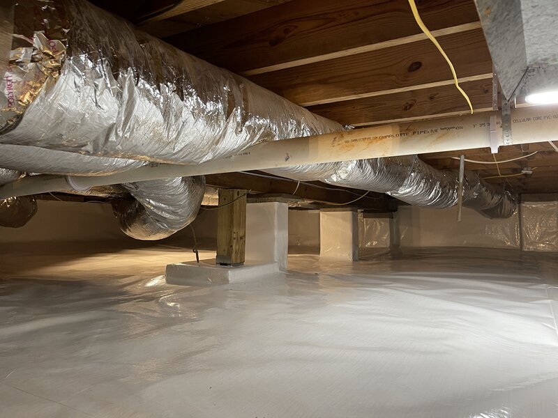A fully encapsulated crawlspace in Atlanta by APS Waterproofing, designed to control humidity and improve air quality.