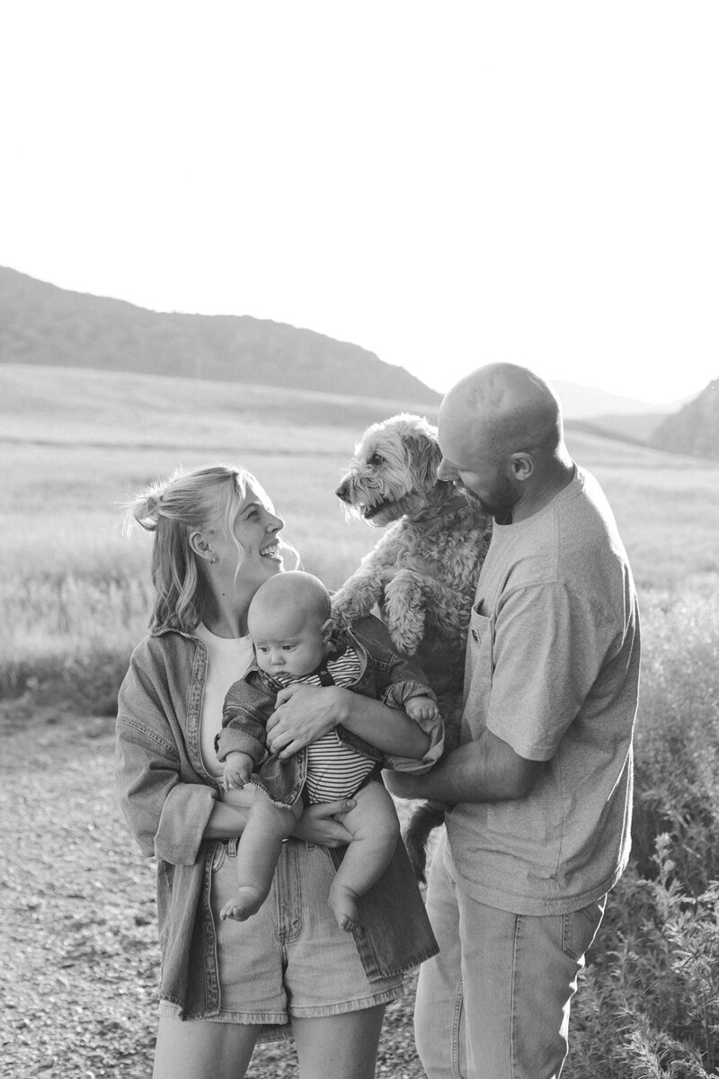 Colorado wedding photographer with her husband, baby, and dog.