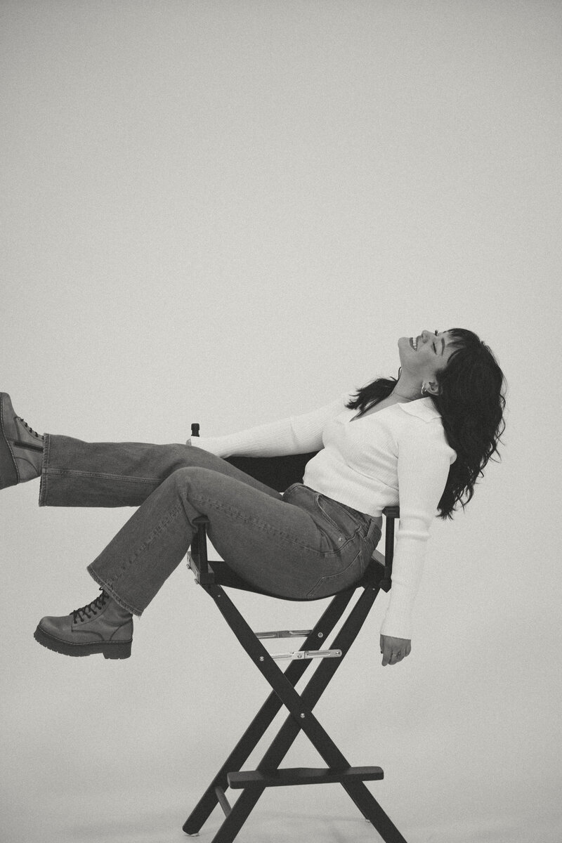 Photographer sitting in movie chair
