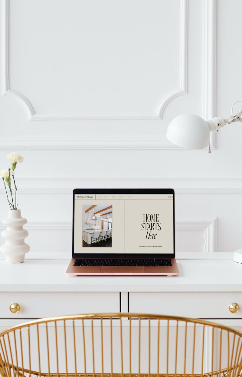 A laptop sitting on a desk with Hollingsworth Design's new website
