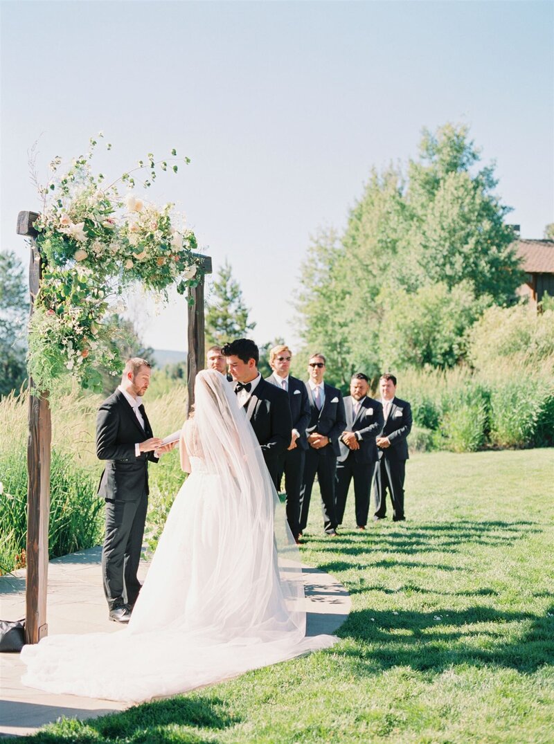 Wedding couple at the front of the alter in Sunriver Resort