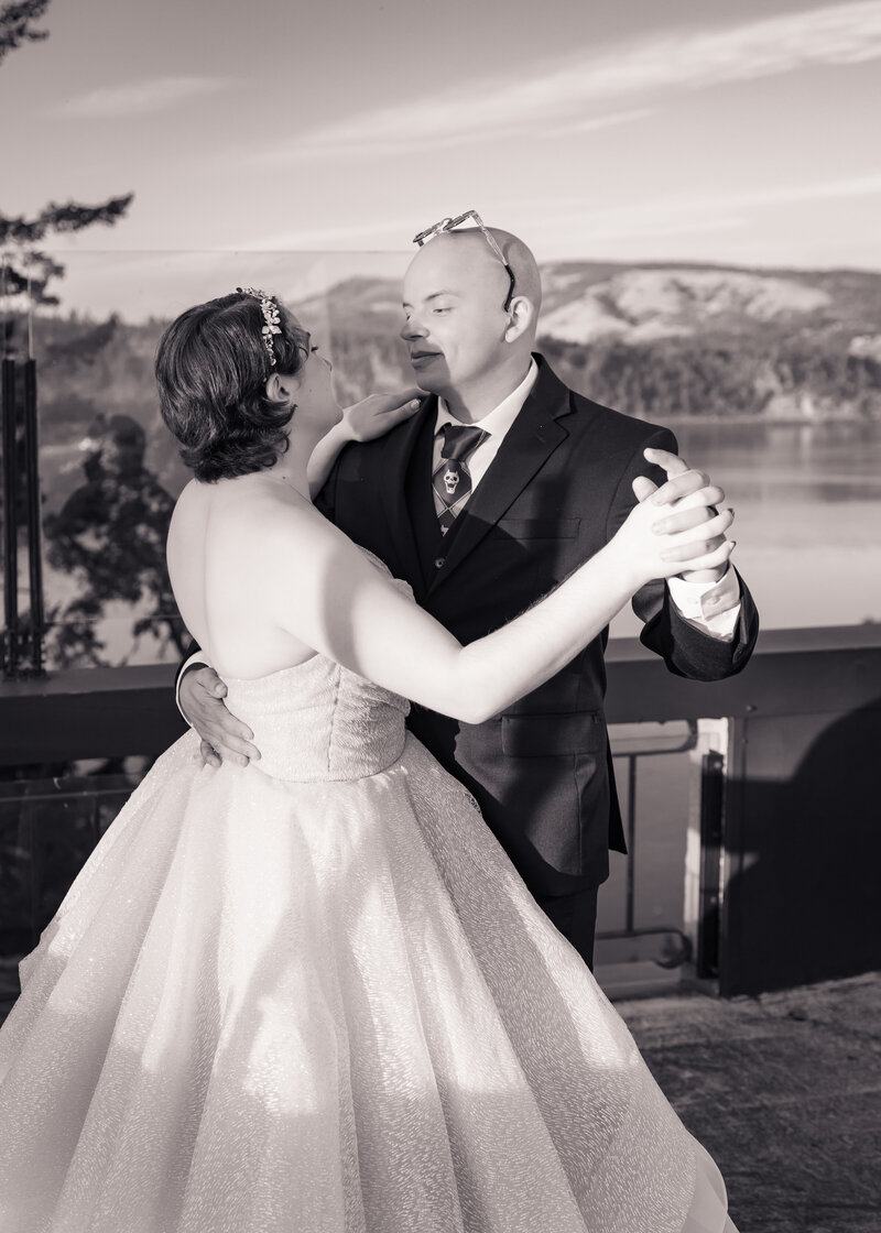 Couple having a private first dance on the roof top of the Columbia Gorge Hotel.
