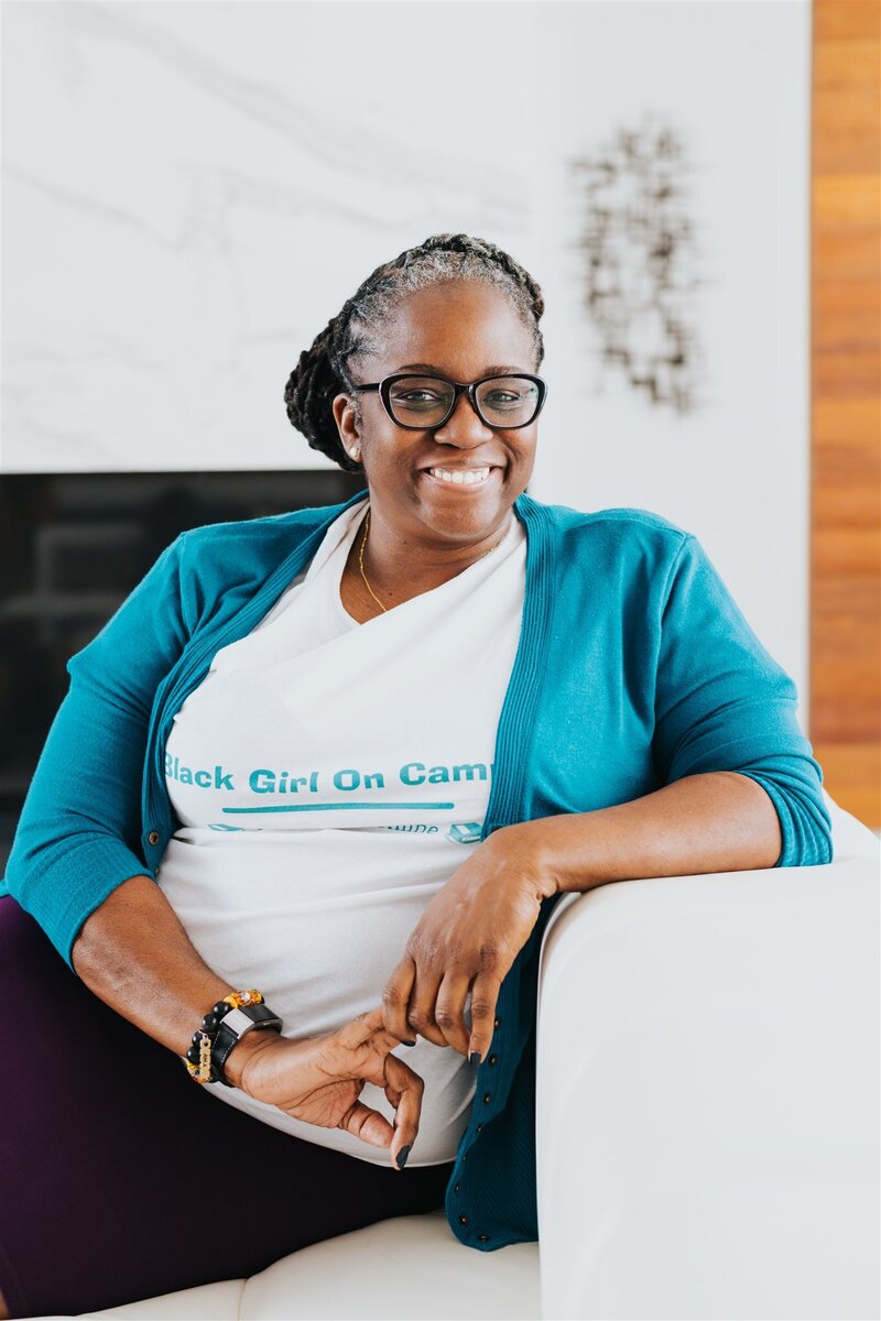 headshot of Monica in a BGOC t-shirt