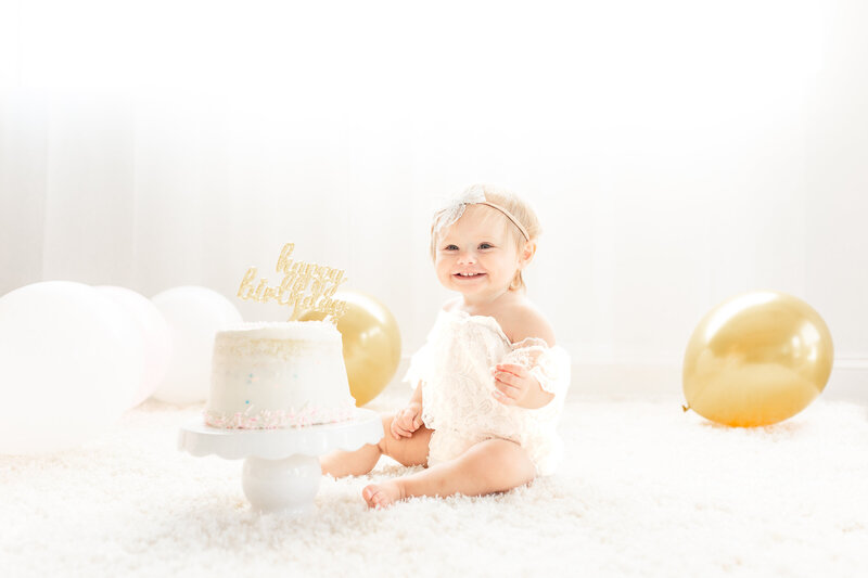 Ann Arbor Maternity Photographer Brooke Leigh Photography takes photos of 1 year old baby girl at Studio Neue in Plymouth Michigan